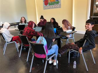 students gathered while sitting